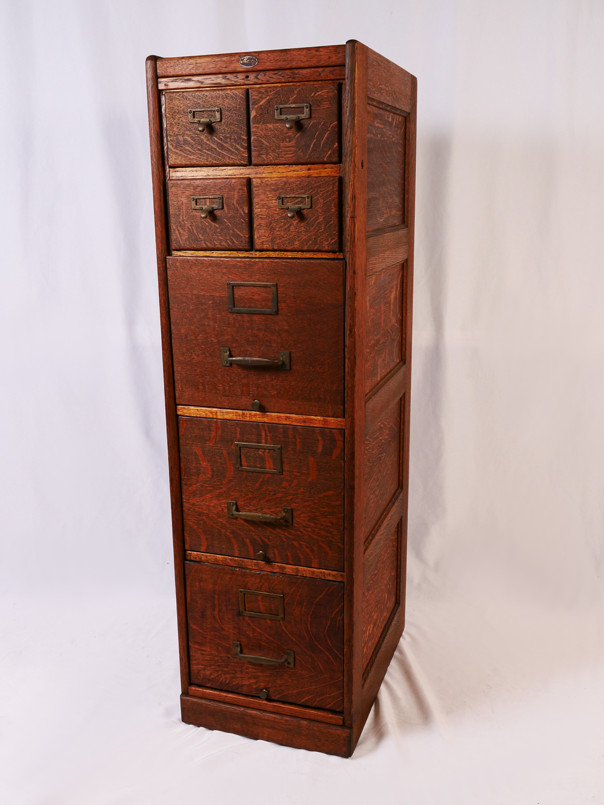 Appraisal: MACEY OAK FILE CABINET Four drawer card catalog drawers over