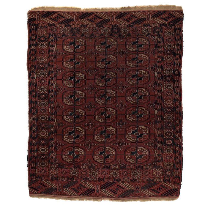 Appraisal: Turkoman rug c stylized floral design on a red field