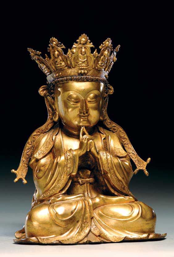 Appraisal: MING-STYLE GILT BRONZE BUDDHA Chinese Ming-style gilt bronze seated figure