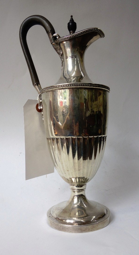 Appraisal: An Edwardian silver claret or water jug William Hutton Sons