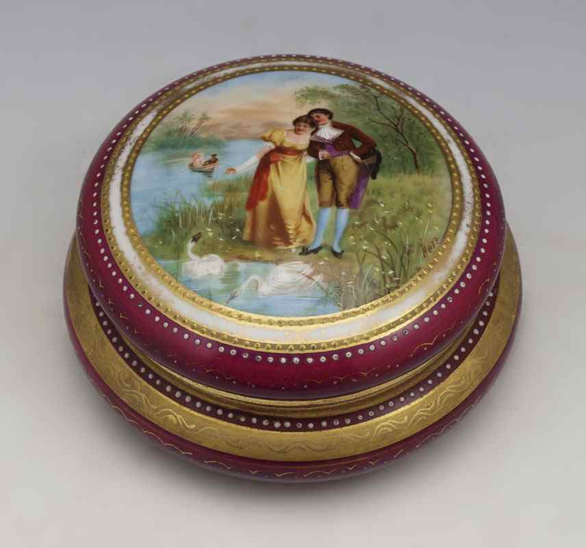 Appraisal: ROYAL VIENNA PORCELAIN BOX Hand painted scene on lid of