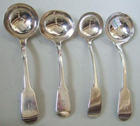 Appraisal: A pair of silver fiddle pattern sauce ladles London a