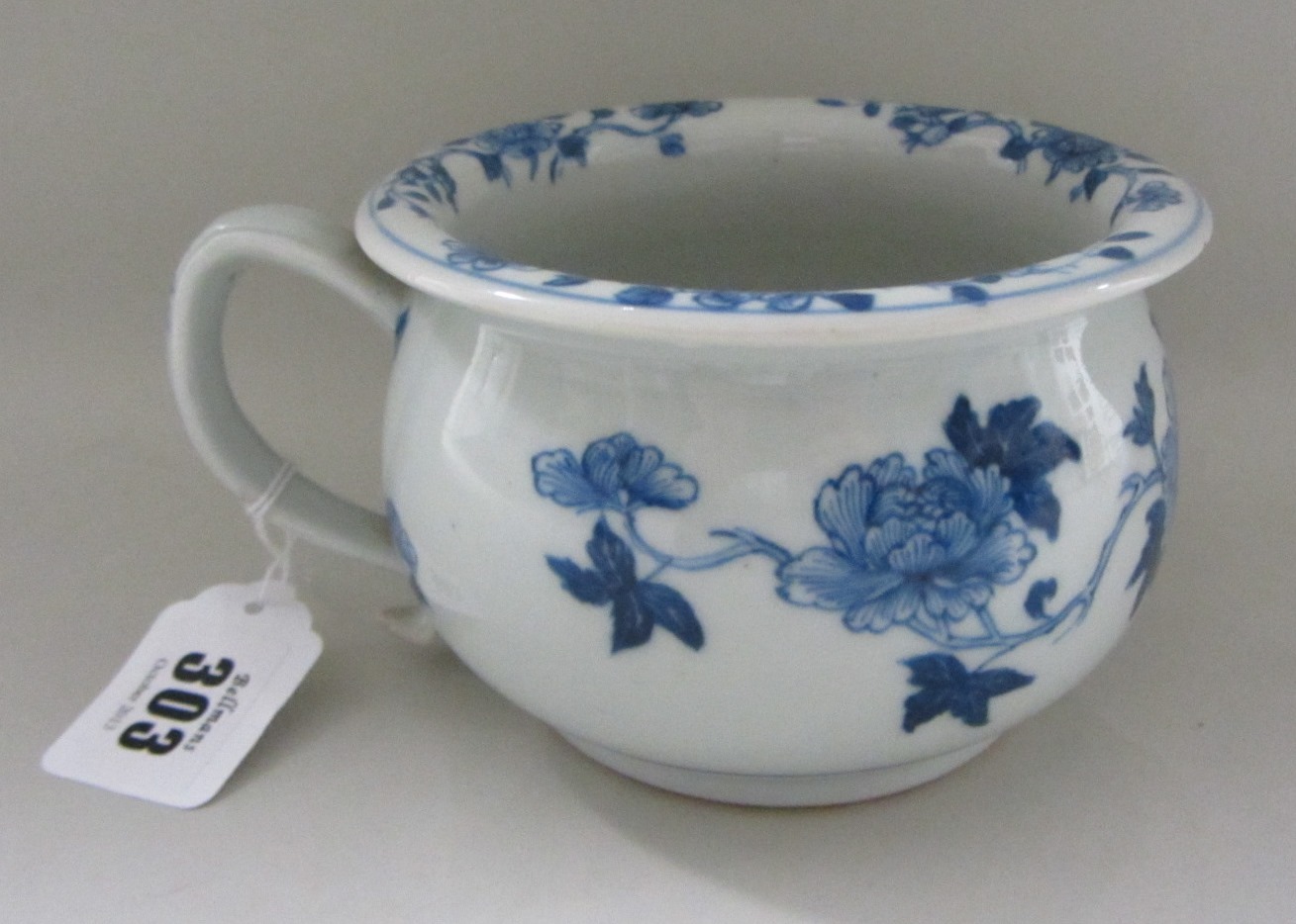 Appraisal: A Nanking Cargo' blue and white child's chamber pot circa