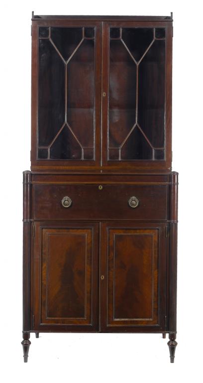 Appraisal: A MAHOGANY SECRETAIRE-BOOKCASE the upper part with adjustable shelves enclosed