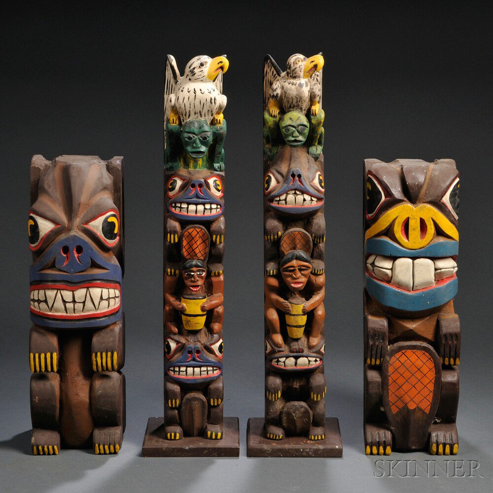 Appraisal: Four Polychrome Carved Wood Folk Art Totem Poles two matched