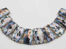 Appraisal: An enamel on silver Norwegian bracelet depicting Nordic scenes marked