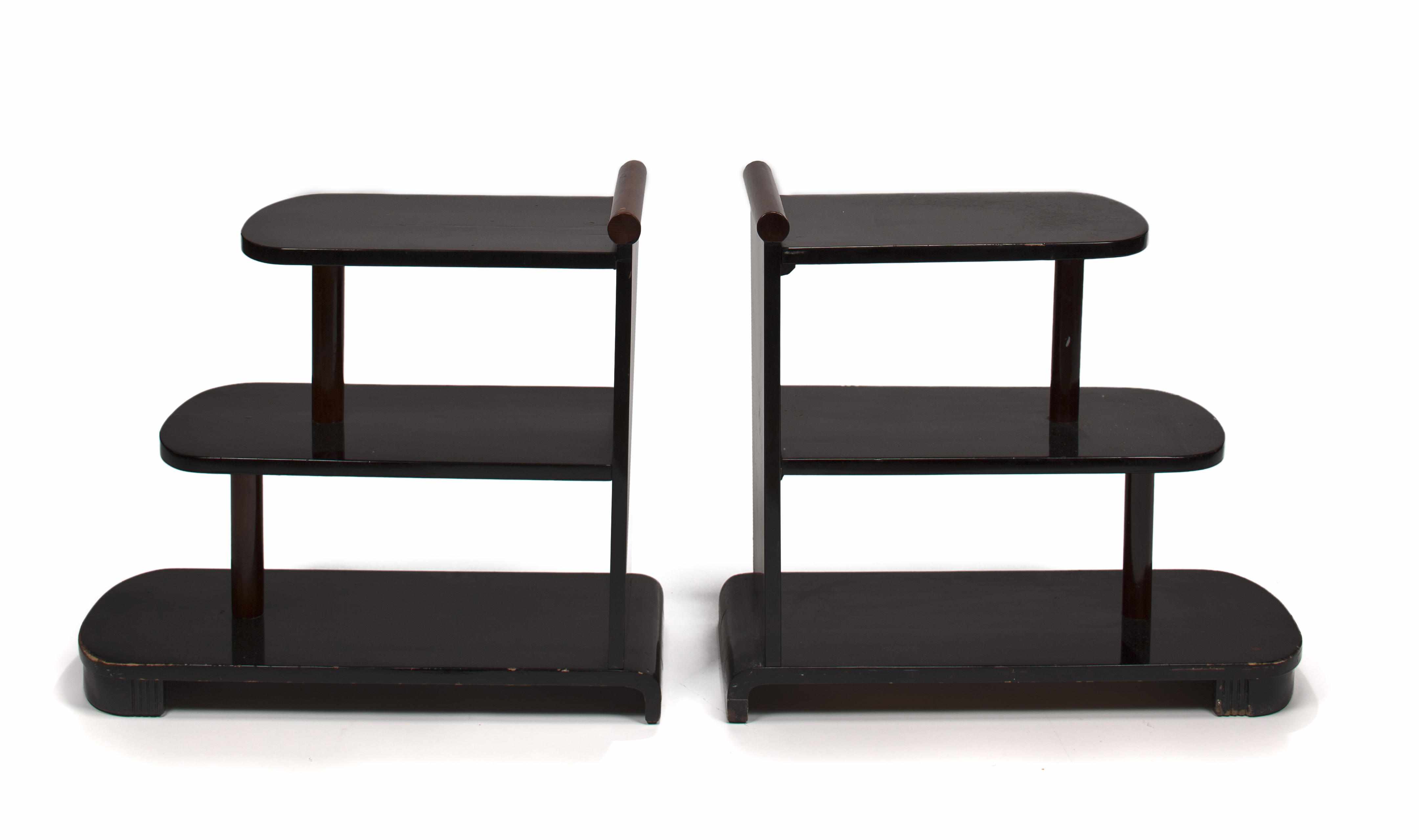 Appraisal: A pair of Art Deco ebonized mahogany stepped end tables