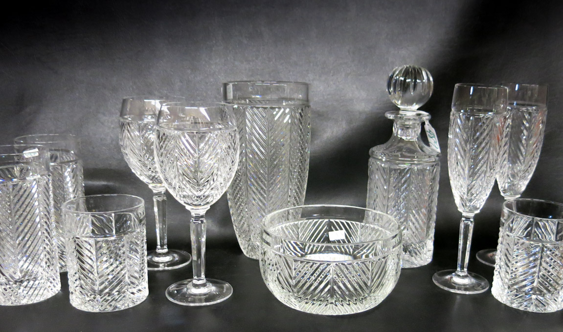 Appraisal: RALPH LAUREN HERRINGBONE CRYSTAL TABLEWARE SET thirty-two pieces comprised of