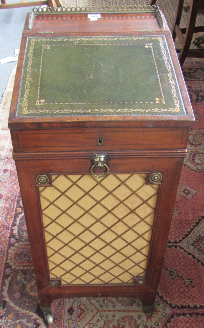 Appraisal: A Regency brass mounted mahogany and ebony inlaid Davenport of