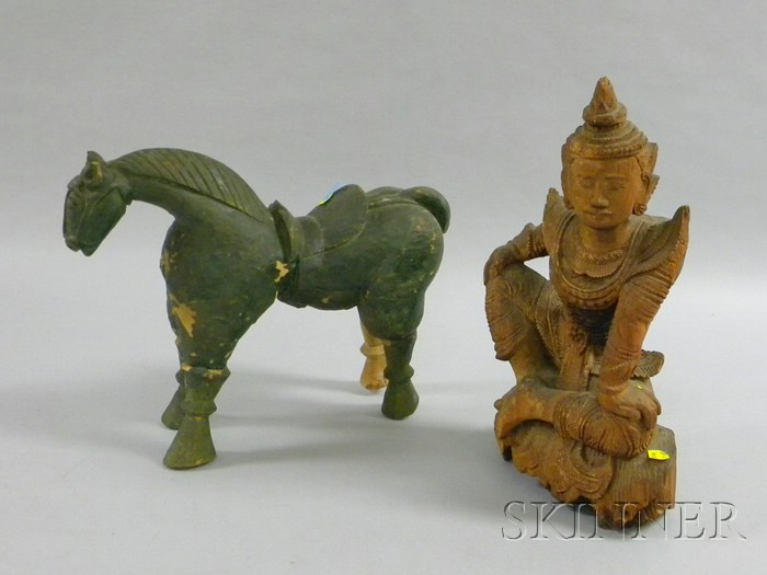 Appraisal: Two Indian Carved Wooden Figures seated Buddha figure and a