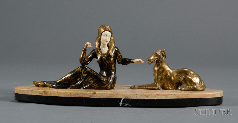 Appraisal: Sculpture of a Lady and a Dog Bronze and ivory