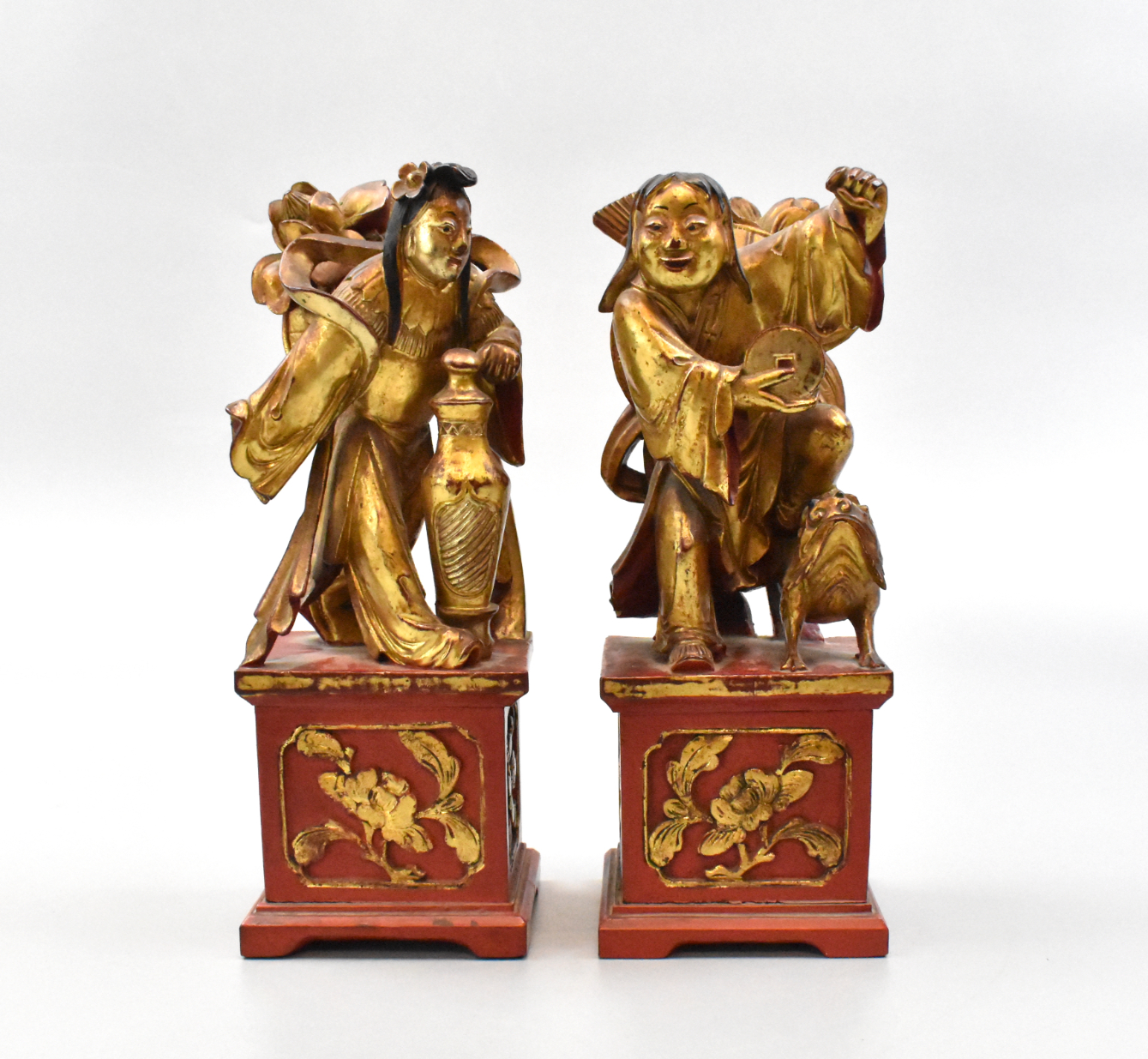 Appraisal: A pair of Chinese wood figurines dated to Late Qing