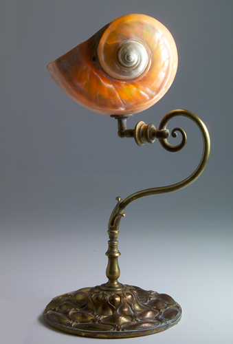 Appraisal: ARTS CRAFTS Lamp with a brass-washed hammered copper base and