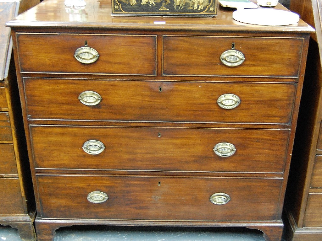 Appraisal: A George III mahogany chest of two short over three