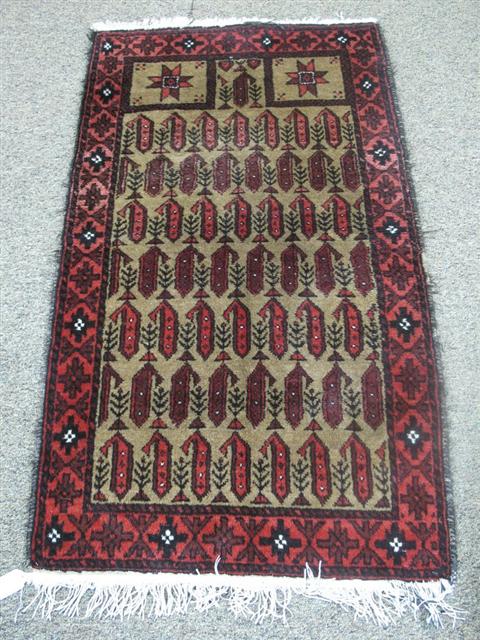 Appraisal: ORIENTAL RUG Red black and brown tones - h w