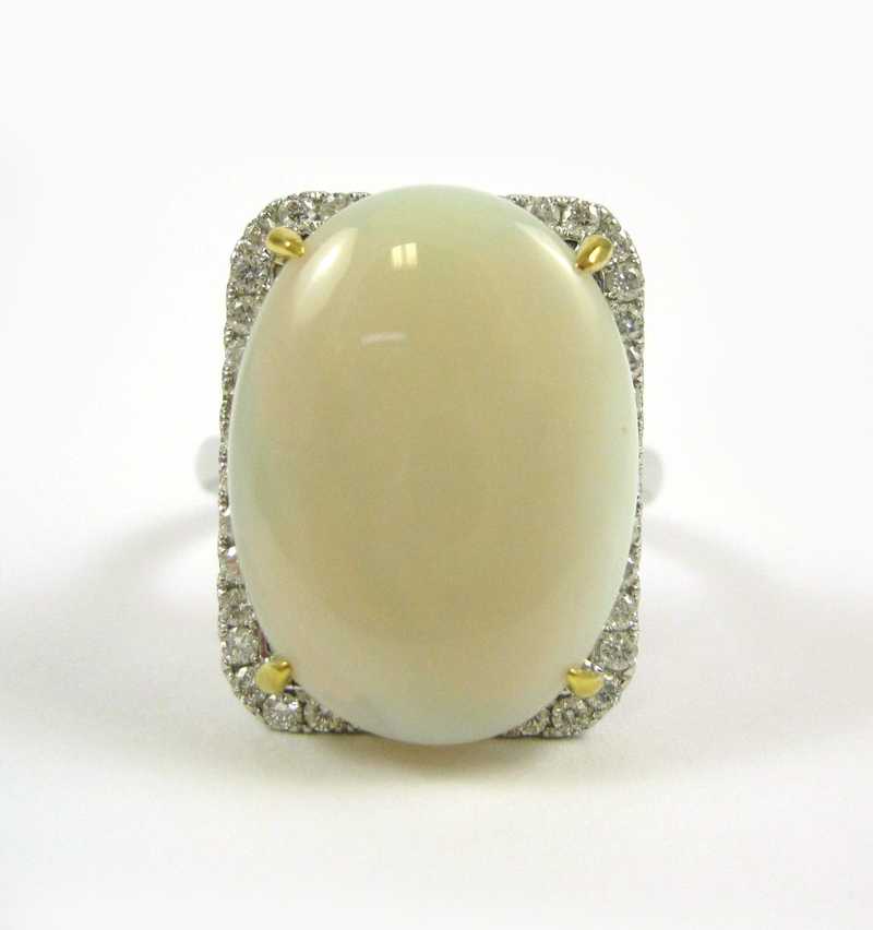 Appraisal: OPAL AND DIAMOND KARAT WHITE AND YELLOW GOLD RING the