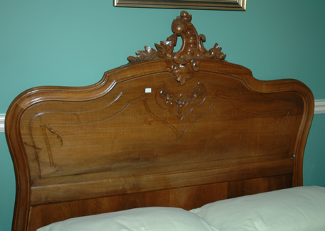 Appraisal: A FRENCH WALNUT FRAMED DOUBLE BED