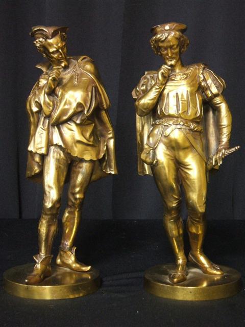 Appraisal: PAIR OF GILT-BRONZE FIGURES OF DEVIL AND MAN Each standing