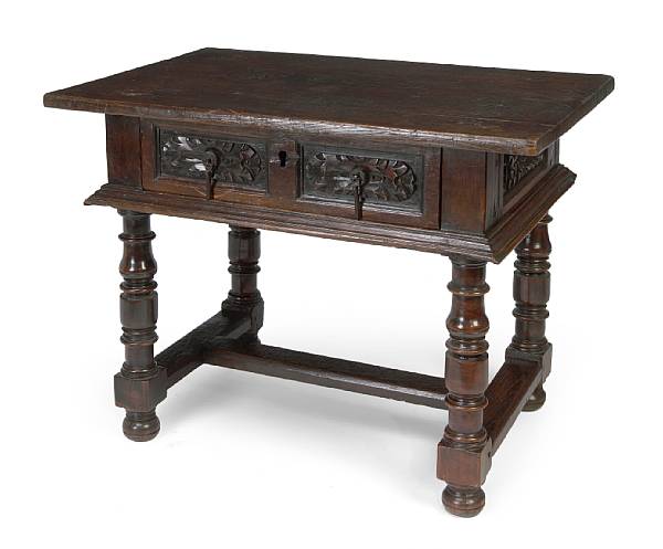 Appraisal: An Italian Baroque carved walnut side table incorporating antique and