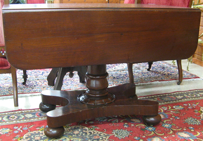 Appraisal: EMPIRE MAHOGANY DROP-LEAF BREAKFAST TABLE American early th century having