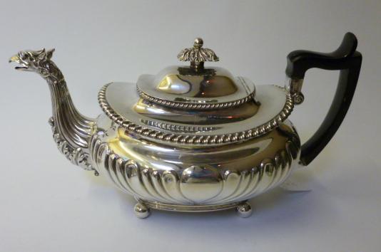 Appraisal: A LATE GEORGE III TEAPOT maker's mark probably IW Sheffield