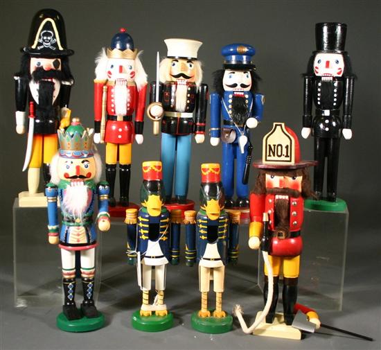 Appraisal: Group of nine modern figural nutcrackers Including traditional form as