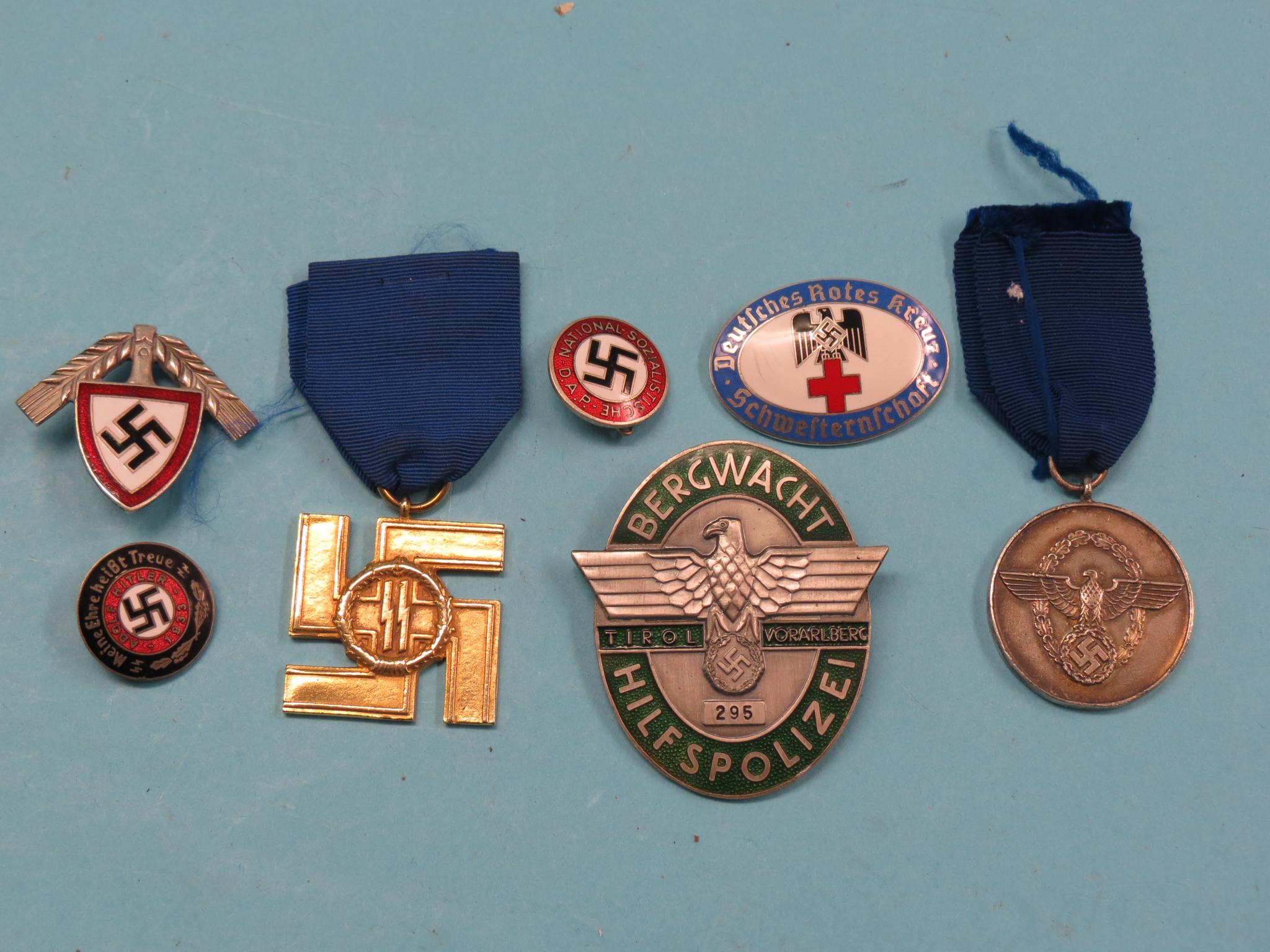 Appraisal: Third Reich badges seven total five with enamelled detail