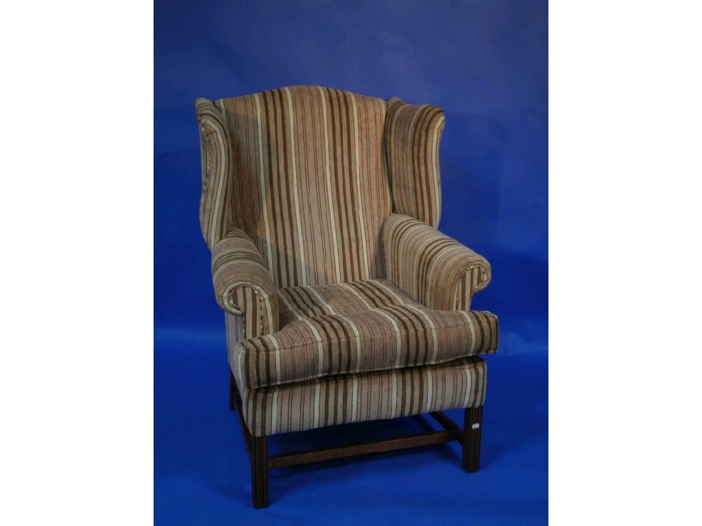 Appraisal: A modern wing back mahogany framed armchair in the Georgian