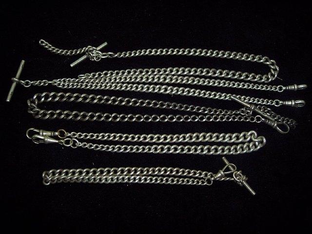 Appraisal: A silver watch chain cm long and four further examples