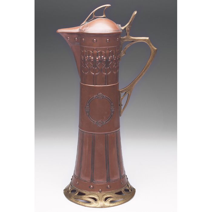 Appraisal: WMF handled vessel copper and brass with hammered and reticulated