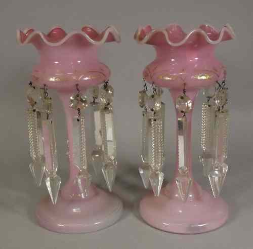 Appraisal: A pair of th Century Bohemian pink opaque glass lustre