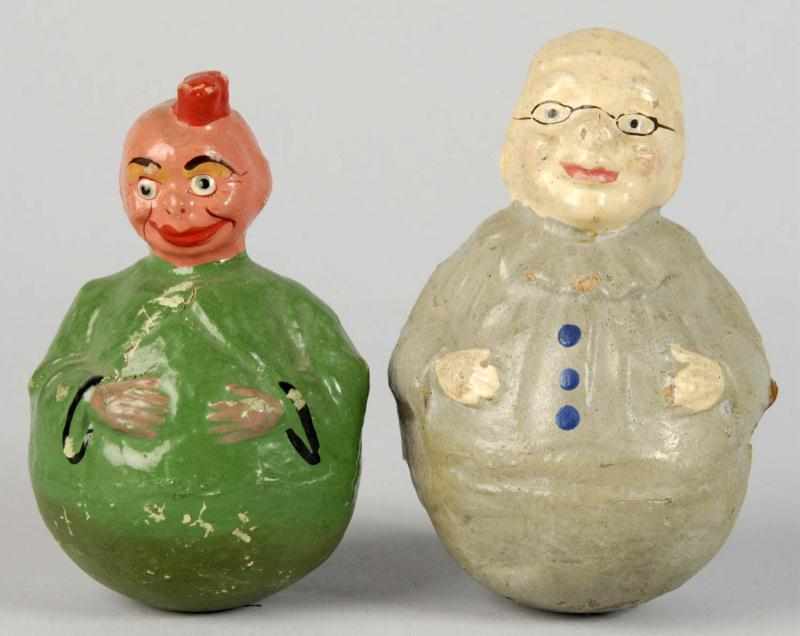 Appraisal: Lot of Paper Mache Character Roly Polys Description German Includes