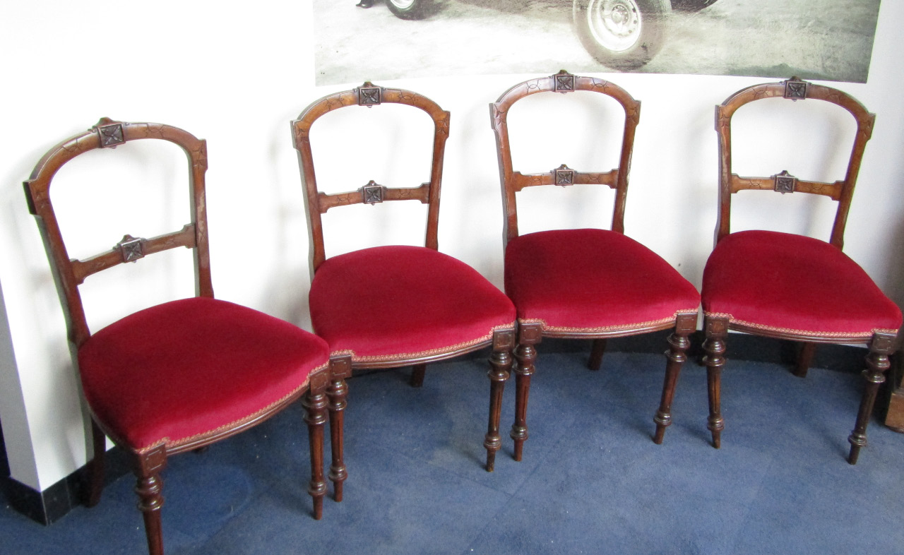 Appraisal: A set of four Victorian walnut single dining chairs with