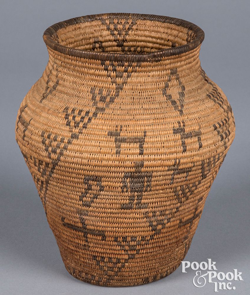 Appraisal: Apache Indian olla-form basket Apache Indian olla-form basket with animal