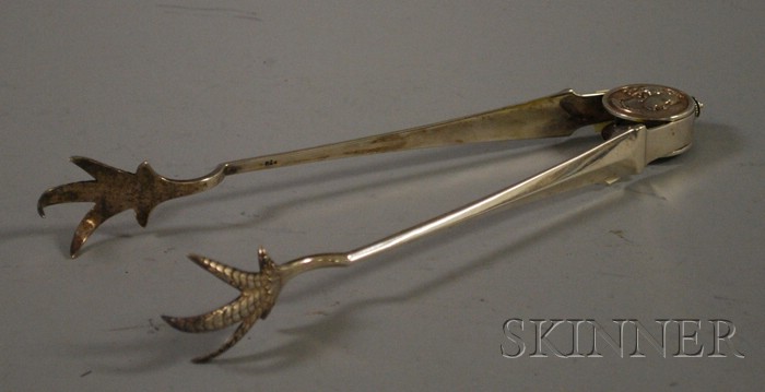 Appraisal: Large Pair of Gorham Sterling Silver Tongs Medallion pattern neoclassical