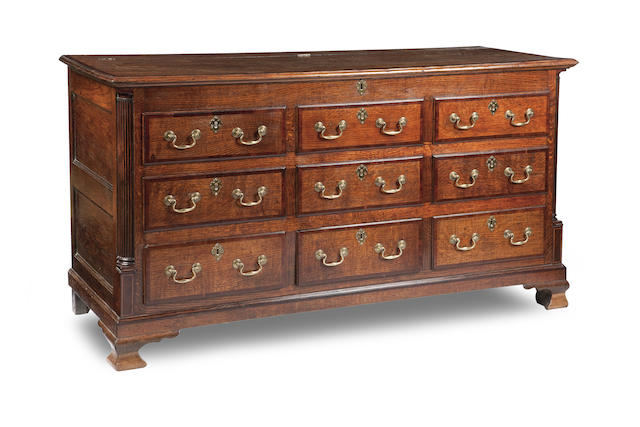 Appraisal: A George III Oak and Mahogany banded mule chest The