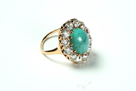 Appraisal: TURQUOISE AND DIAMOND RING Ladies gold ring with oval turquoise