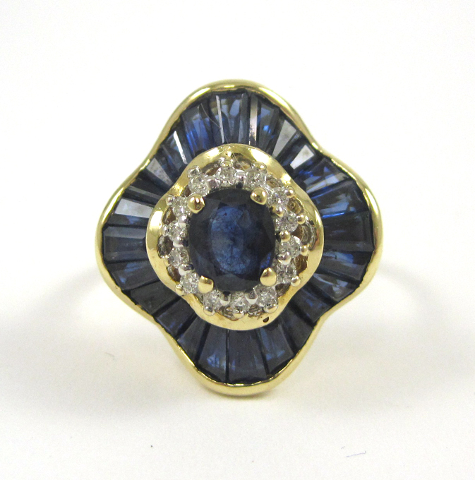 Appraisal: SAPPHIRE DIAMOND AND EIGHTEEN KARAT GOLD RING The yellow gold