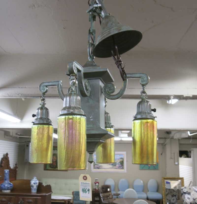 Appraisal: A FOUR-LIGHT CEILING FIXTURE the metal fixture having a verde