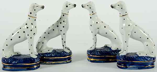 Appraisal: Staffordshire Ceramic Dalmatians th century four Staffordshire ceramic seated dalmatians