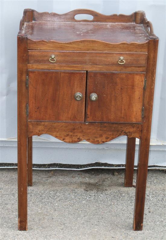 Appraisal: A th century mahogany tray-top pot cupboard on square legs