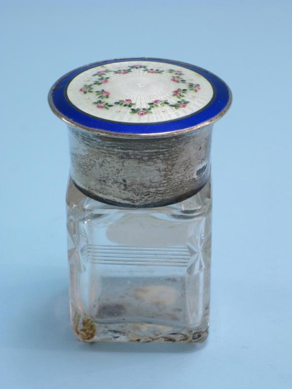 Appraisal: A cut glass square Scent Bottle with silver lid inset