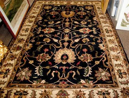 Appraisal: Persian design tufted rug x Estimate - No condition report