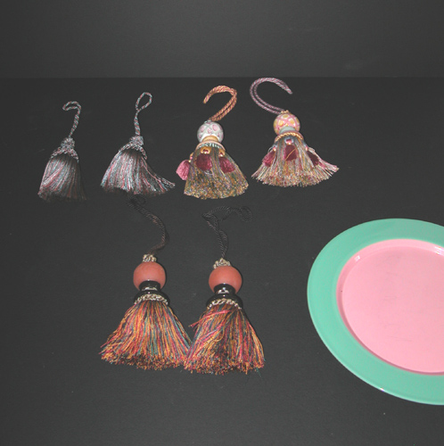 Appraisal: Assorted Tiebacks including Mackenzie Childs Tiebacks and ceramic plate th