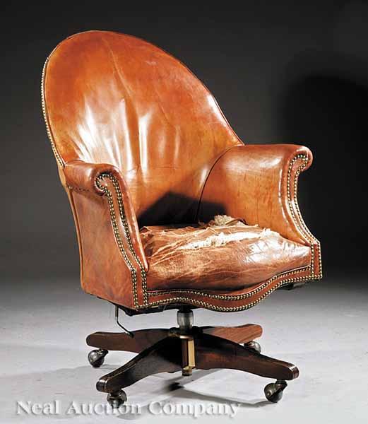 Appraisal: A Georgian-Style Leather Desk Chair mid- th c horse-shoe back