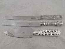 Appraisal: A mixed lot comprising three sabbath bread knives each with