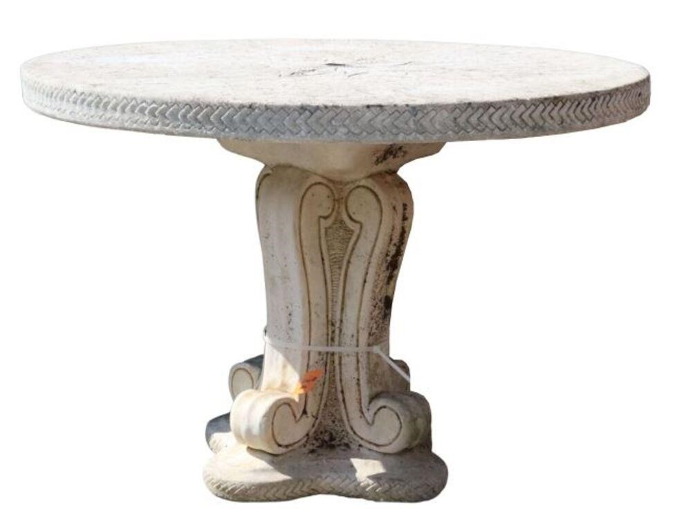 Appraisal: Cast stone garden patio table having round top with central