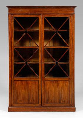 Appraisal: Regency mahogany bookcase cabinet figured mahogany veneers with oak secondary