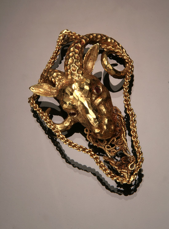 Appraisal: -Karat Yellow-Gold and Ruby 'Aries Zodiac' Clip The ram's eyes