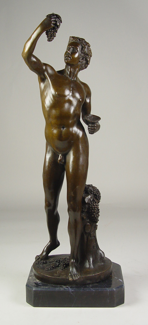 Appraisal: Bronze of Nude Man with Grapes After Jossin Oval base